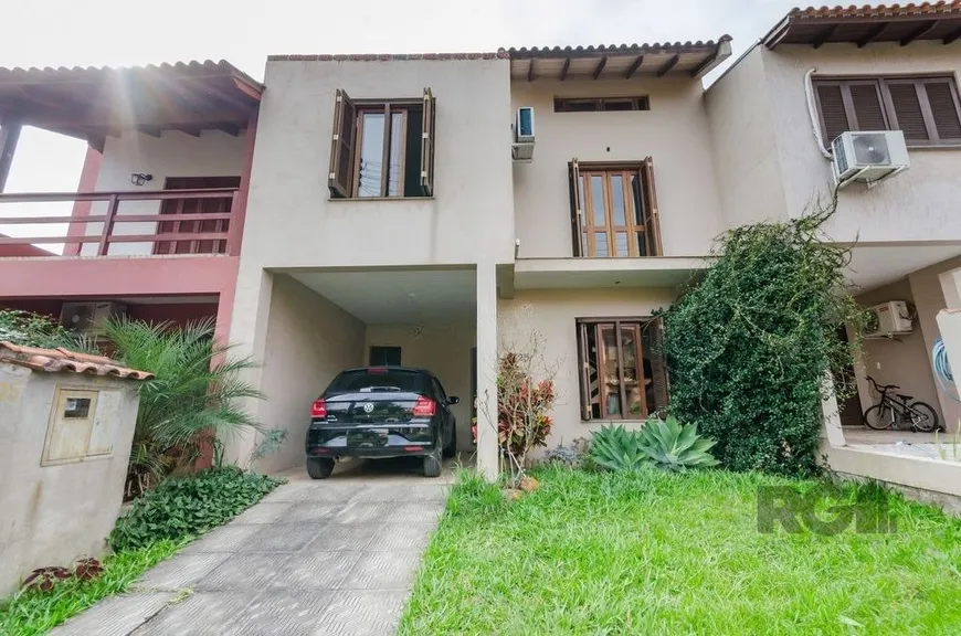 Foto 1 de Casa de Condomínio com 3 Quartos à venda, 167m² em Guarujá, Porto Alegre