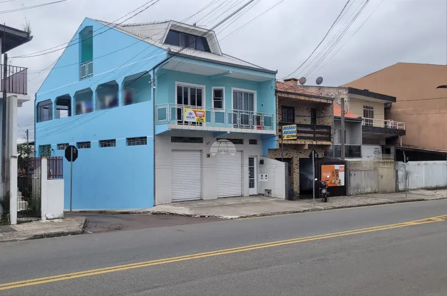 Foto 1 de Sobrado com 4 Quartos à venda, 228m² em Sitio Cercado, Curitiba