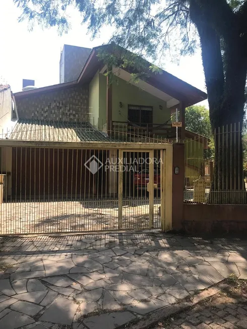 Foto 1 de Casa com 5 Quartos à venda, 487m² em Jardim Lindóia, Porto Alegre