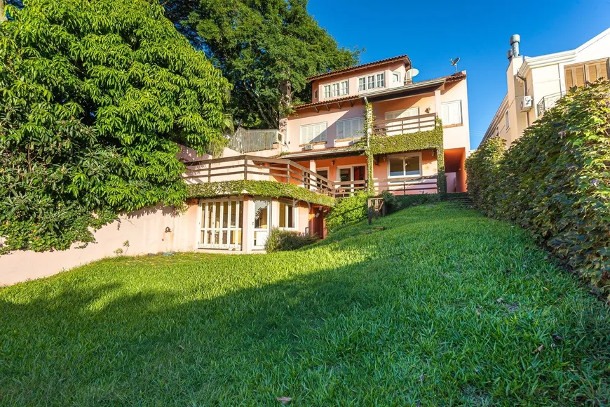 Foto 1 de Casa com 4 Quartos à venda, 380m² em Setimo Ceu, Porto Alegre