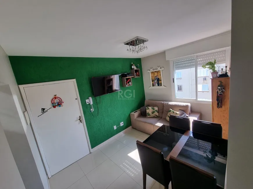 Foto 1 de Apartamento com 2 Quartos à venda, 48m² em Santo Antônio, Porto Alegre