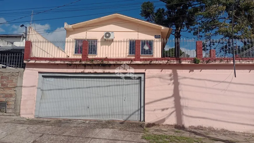 Foto 1 de Casa com 5 Quartos à venda, 300m² em Partenon, Porto Alegre