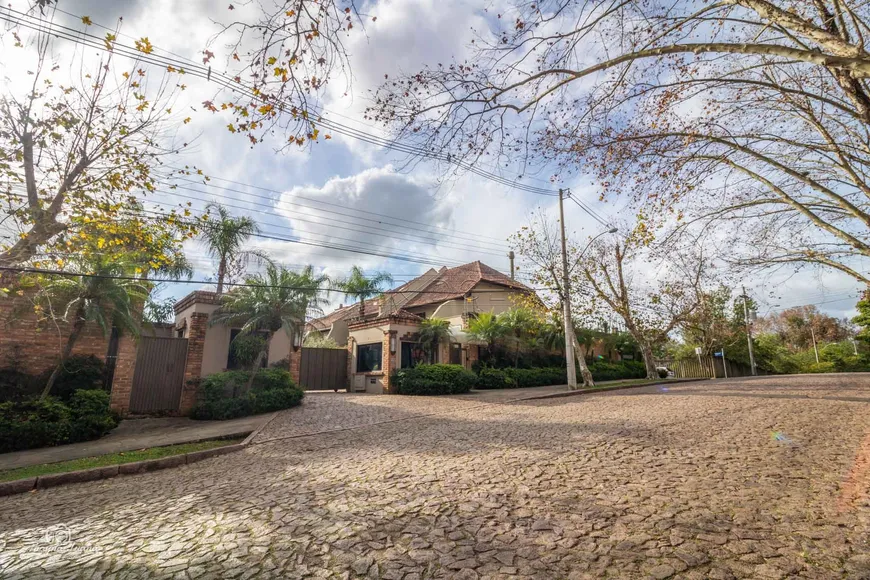 Foto 1 de Casa de Condomínio com 3 Quartos para venda ou aluguel, 487m² em Boa Vista, Porto Alegre