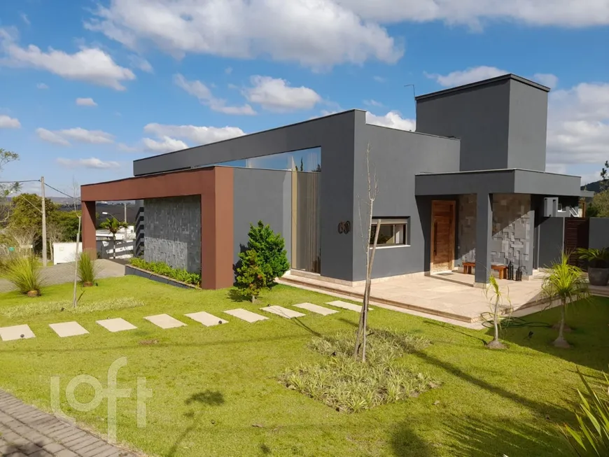 Foto 1 de Casa com 4 Quartos à venda, 326m² em Alphaville Lagoa Dos Ingleses, Nova Lima