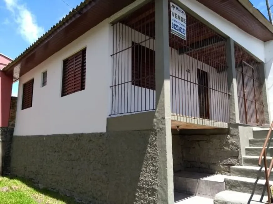 Foto 1 de Casa com 2 Quartos à venda, 70m² em Vila Nova, Porto Alegre