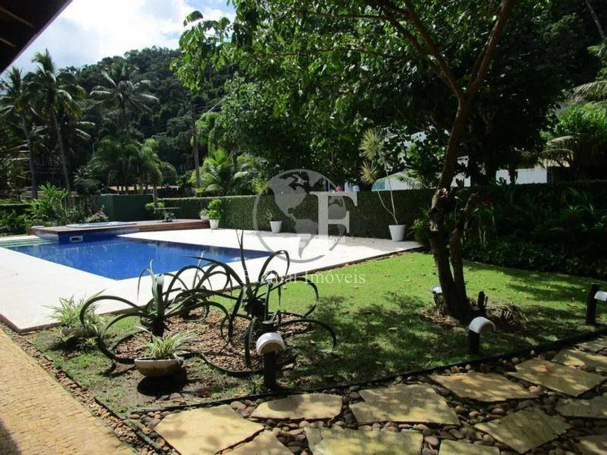 Foto 1 de Casa de Condomínio com 4 Quartos à venda, 400m² em Balneário Praia do Perequê , Guarujá