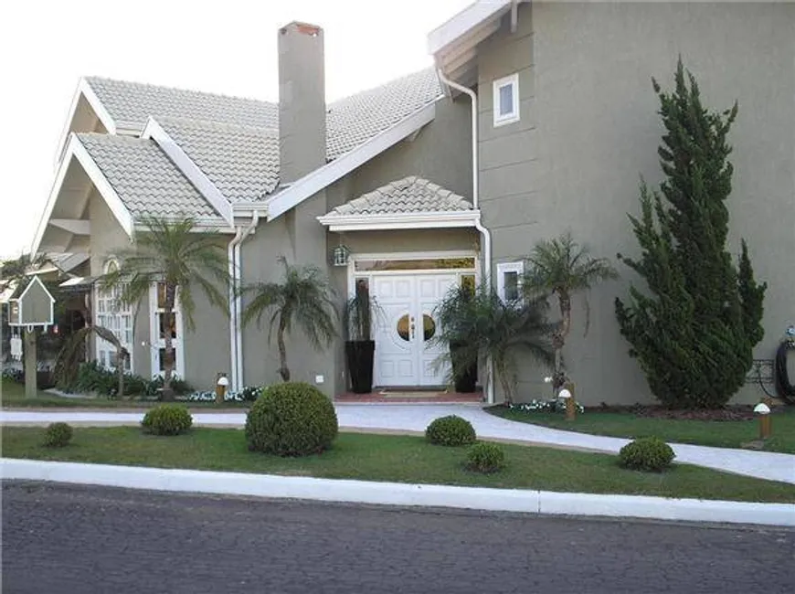 Foto 1 de Casa de Condomínio com 5 Quartos para venda ou aluguel, 610m² em Colinas do Ermitage, Campinas