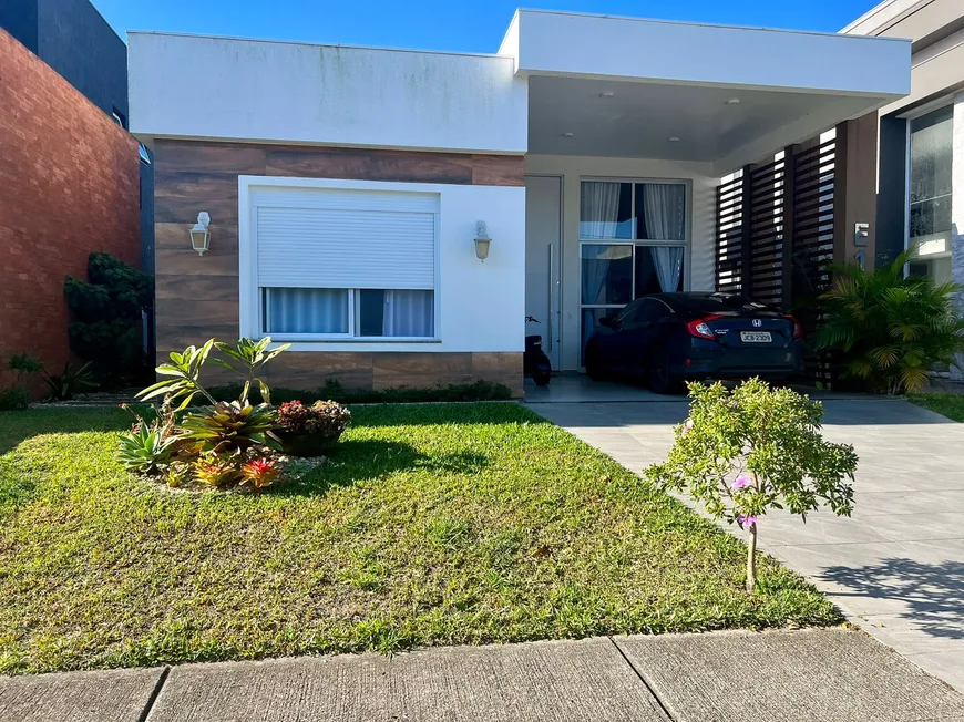 Foto 1 de Casa de Condomínio com 4 Quartos à venda, 191m² em Curumim, Capão da Canoa