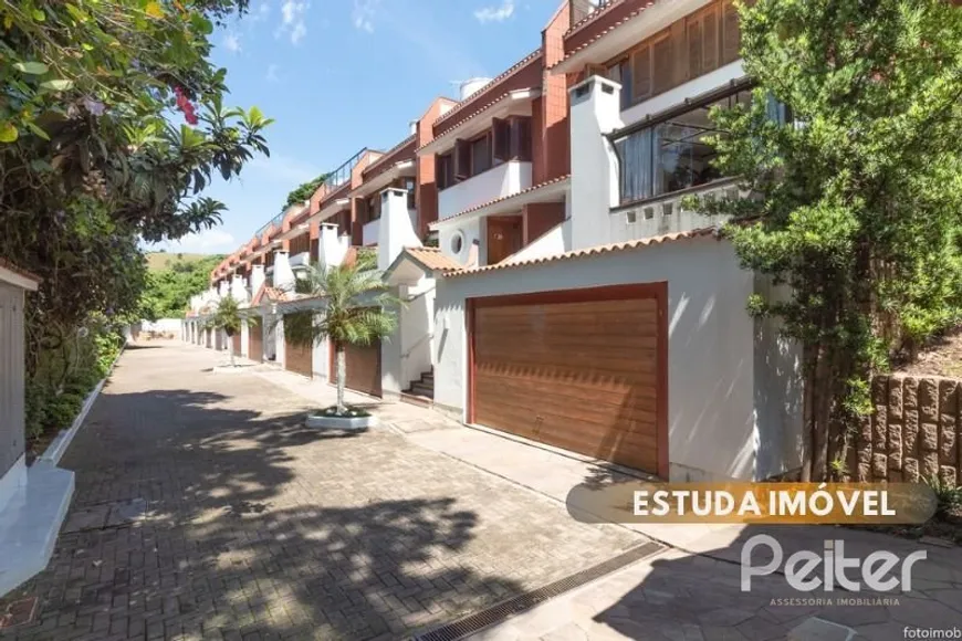 Foto 1 de Casa de Condomínio com 3 Quartos à venda, 307m² em Cristal, Porto Alegre