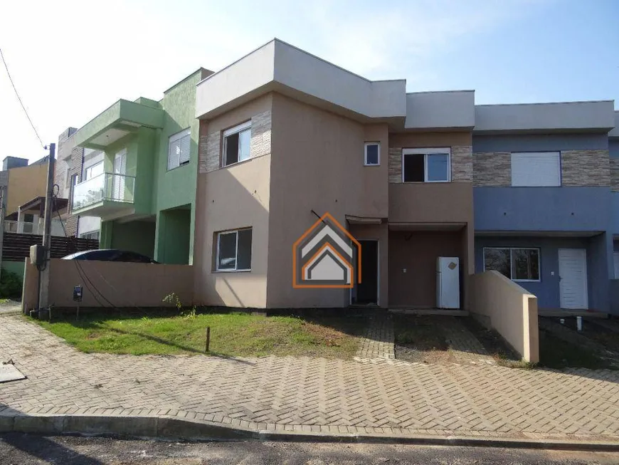 Foto 1 de Casa de Condomínio com 3 Quartos à venda, 200m² em Mário Quintana, Porto Alegre