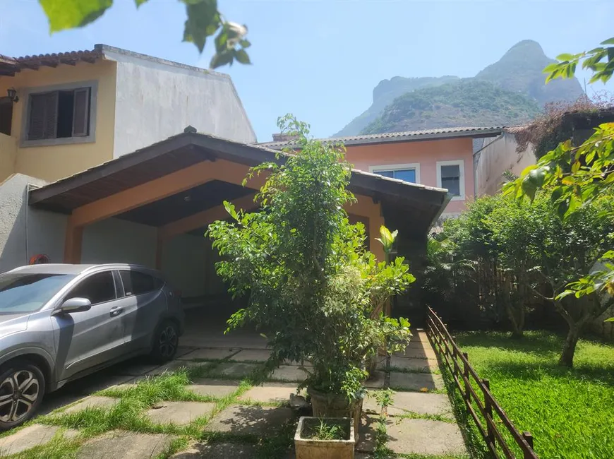 Foto 1 de Casa com 4 Quartos à venda, 396m² em Barra da Tijuca, Rio de Janeiro