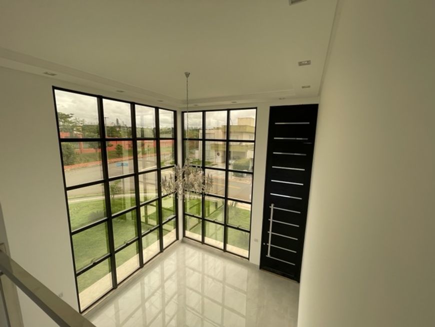 Foto 1 de Casa de Condomínio com 5 Quartos à venda, 442m² em Jardins Valencia, Goiânia