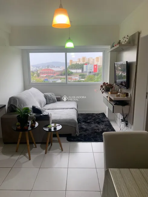 Foto 1 de Apartamento com 1 Quarto à venda, 38m² em Santo Antônio, Porto Alegre