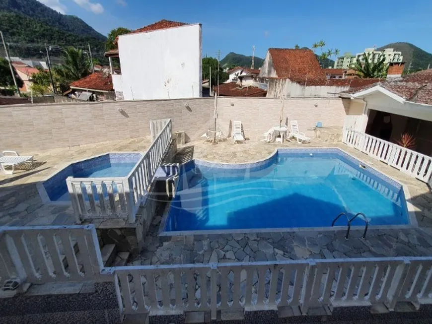 Foto 1 de Casa de Condomínio com 2 Quartos à venda, 90m² em Martim de Sa, Caraguatatuba