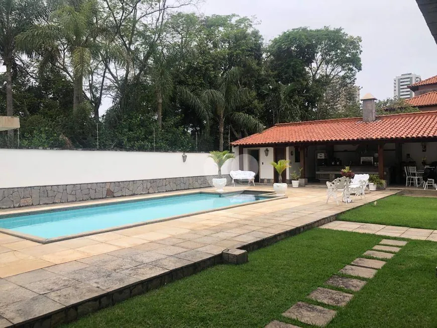 Foto 1 de Casa de Condomínio com 4 Quartos à venda, 825m² em Barra da Tijuca, Rio de Janeiro