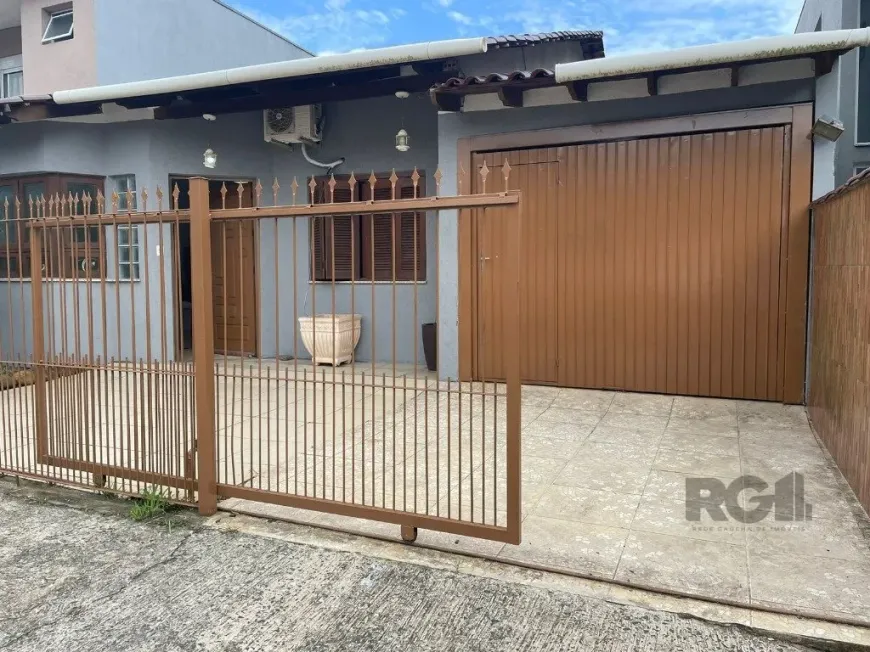 Foto 1 de Casa com 2 Quartos à venda, 105m² em Vila Nova, Porto Alegre