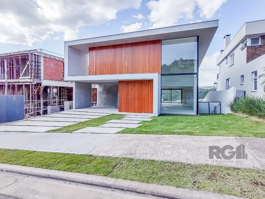 Foto 1 de Casa de Condomínio com 4 Quartos à venda, 401m² em Alphaville, Porto Alegre
