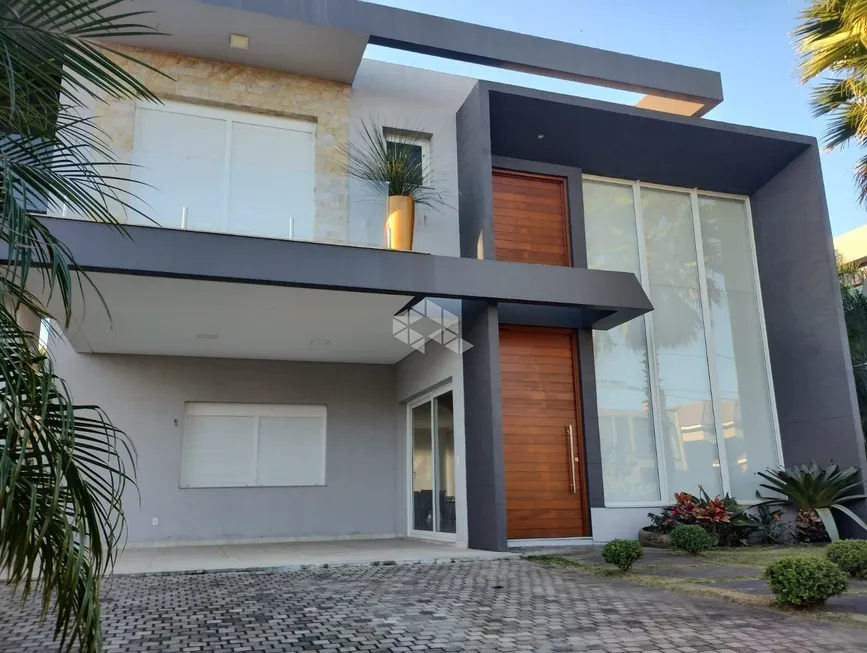 Foto 1 de Casa de Condomínio com 4 Quartos à venda, 380m² em Atlantida, Xangri-lá