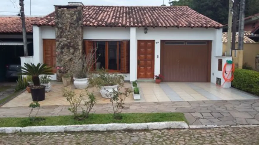 Foto 1 de Casa de Condomínio com 3 Quartos à venda, 110m² em Hípica, Porto Alegre