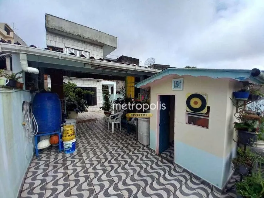 Foto 1 de Sobrado com 3 Quartos à venda, 254m² em Jardim Teles de Menezes, Santo André