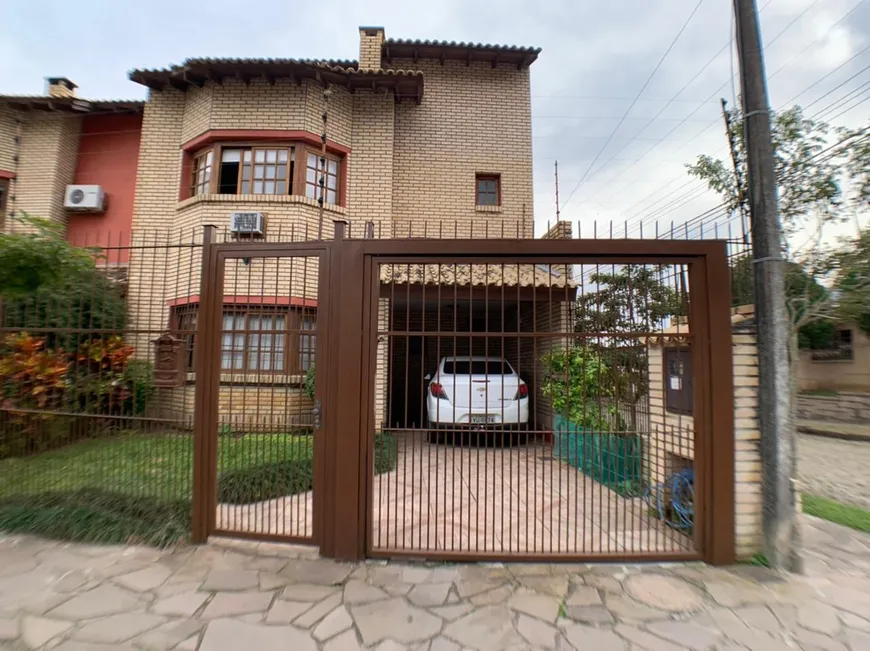 Foto 1 de Casa com 3 Quartos à venda, 183m² em Guarujá, Porto Alegre
