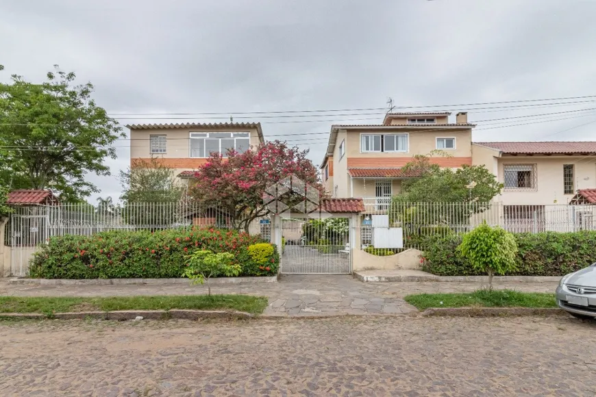 Foto 1 de Casa de Condomínio com 4 Quartos à venda, 150m² em Cristal, Porto Alegre
