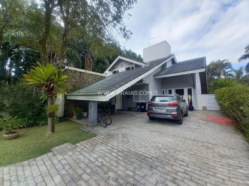 Foto 1 de Casa de Condomínio com 5 Quartos para venda ou aluguel, 324m² em Balneário Praia do Pernambuco, Guarujá