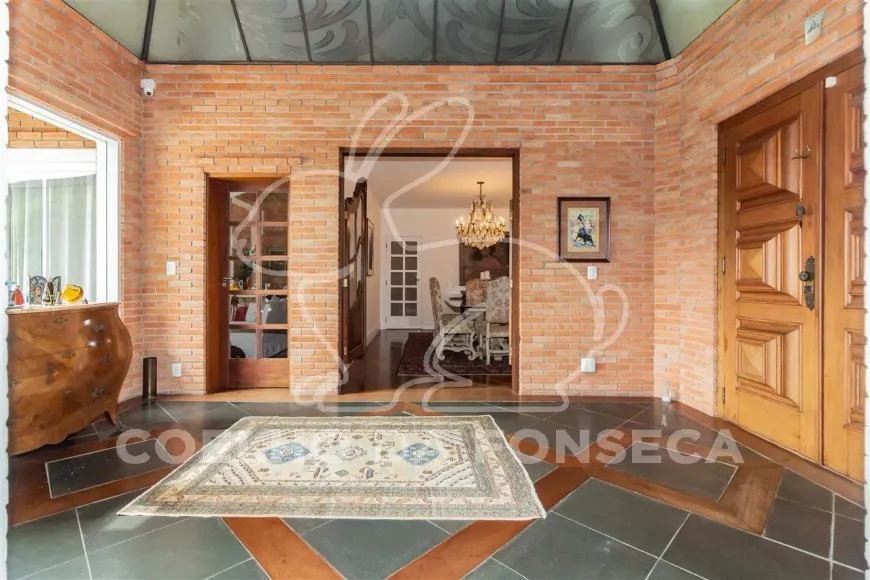 Foto 1 de Casa com 5 Quartos à venda, 573m² em Cidade Jardim, São Paulo