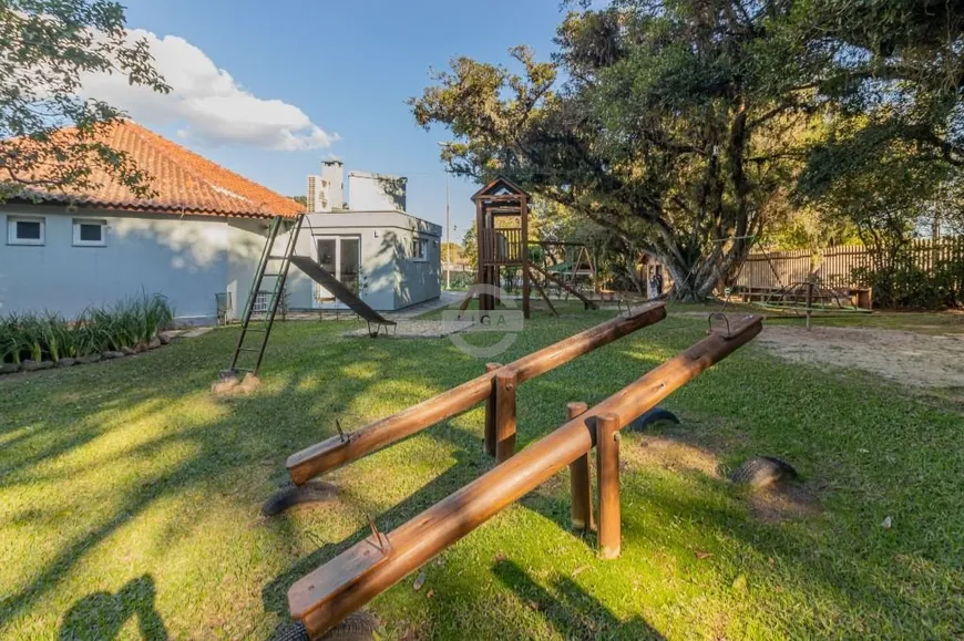 Foto 1 de Casa com 4 Quartos para venda ou aluguel, 750m² em Cavalhada, Porto Alegre