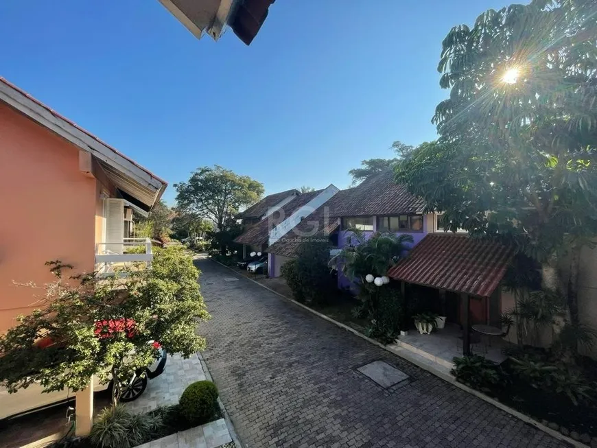 Foto 1 de Casa de Condomínio com 3 Quartos à venda, 252m² em Tristeza, Porto Alegre