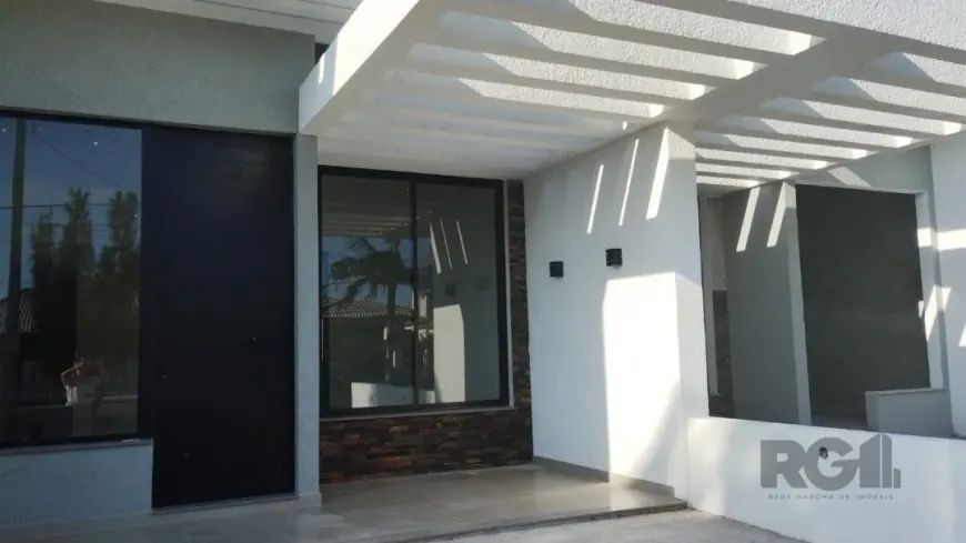 Foto 1 de Casa com 3 Quartos à venda, 94m² em Capao da Canoa, Capão da Canoa