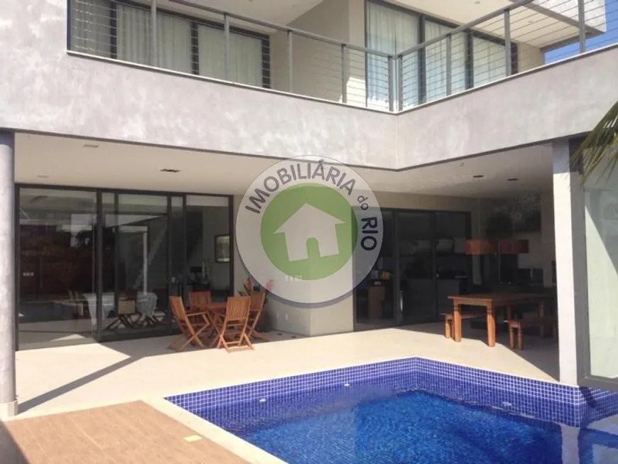 Foto 1 de Casa de Condomínio com 5 Quartos à venda, 686m² em Barra da Tijuca, Rio de Janeiro