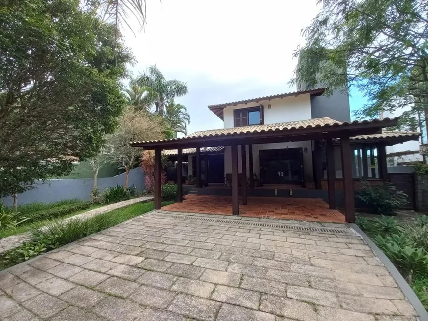 Foto 1 de Casa de Condomínio com 4 Quartos à venda, 300m² em Rio Tavares, Florianópolis