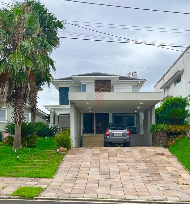 Foto 1 de Casa de Condomínio com 3 Quartos para alugar, 220m² em Alphaville, Gravataí