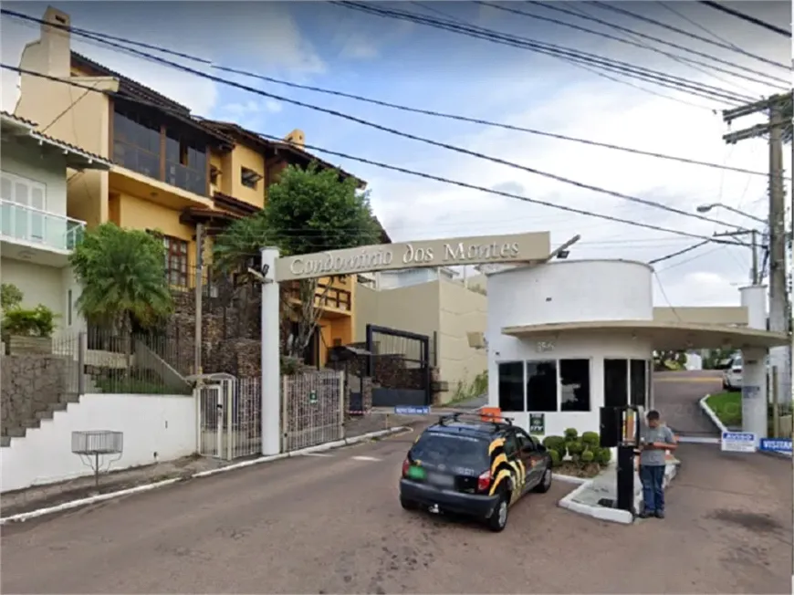 Foto 1 de Casa de Condomínio com 4 Quartos à venda, 309m² em Teresópolis, Porto Alegre