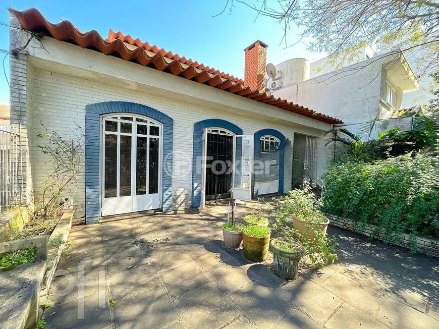 Foto 1 de Casa com 5 Quartos à venda, 304m² em Boa Vista, Porto Alegre