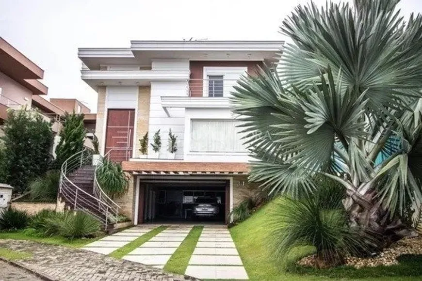 Foto 1 de Casa de Condomínio com 3 Quartos à venda, 420m² em Marechal Rondon, Canoas