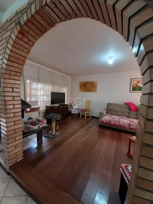 Foto 1 de Casa com 3 Quartos à venda, 261m² em Auxiliadora, Porto Alegre