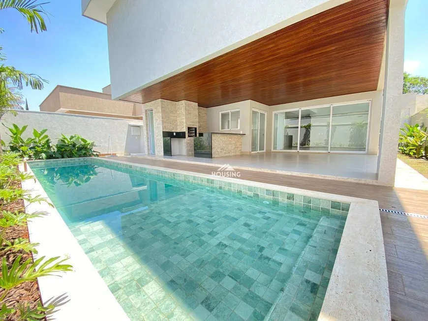 Foto 1 de Casa de Condomínio com 4 Quartos à venda, 342m² em Jardins Valencia, Goiânia