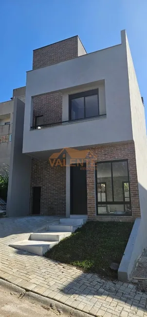 Foto 1 de Casa com 2 Quartos à venda, 101m² em Santa Cândida, Curitiba