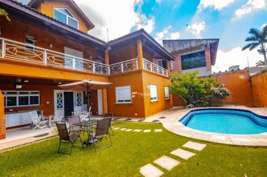 Foto 1 de Casa com 6 Quartos à venda, 360m² em Balneário Praia do Pernambuco, Guarujá