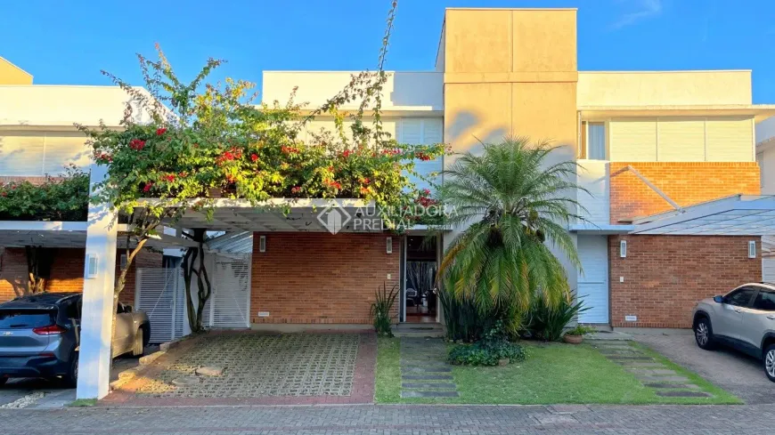 Foto 1 de Casa de Condomínio com 3 Quartos à venda, 185m² em Agronomia, Porto Alegre