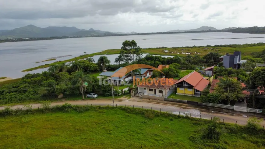 Foto 1 de Casa com 3 Quartos à venda, 87m² em Ibiraquera, Imbituba