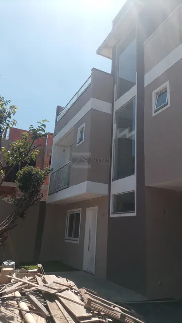 Foto 1 de Casa de Condomínio com 3 Quartos à venda, 119m² em Uberaba, Curitiba