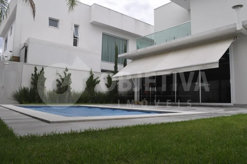 Foto 1 de Casa de Condomínio com 5 Quartos à venda, 300m² em Condominio Gavea Paradiso, Uberlândia