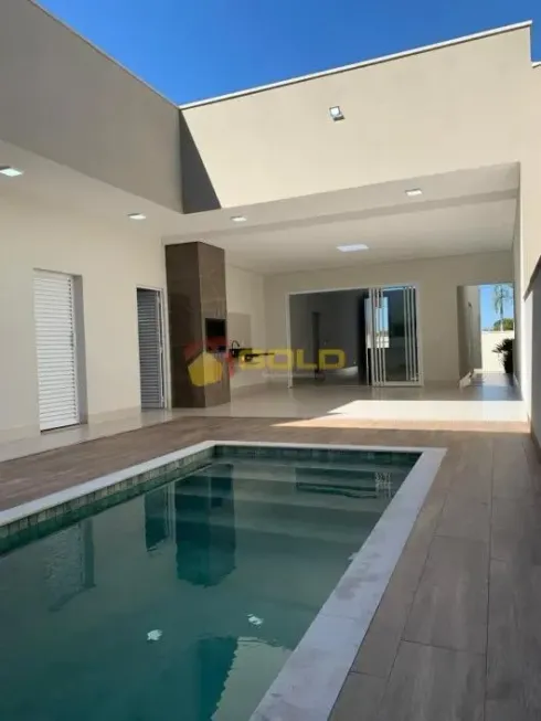 Foto 1 de Casa com 3 Quartos à venda, 211m² em Cidade Jardim, Uberlândia