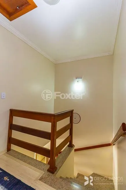 Foto 1 de Casa de Condomínio com 3 Quartos à venda, 153m² em Campo Novo, Porto Alegre