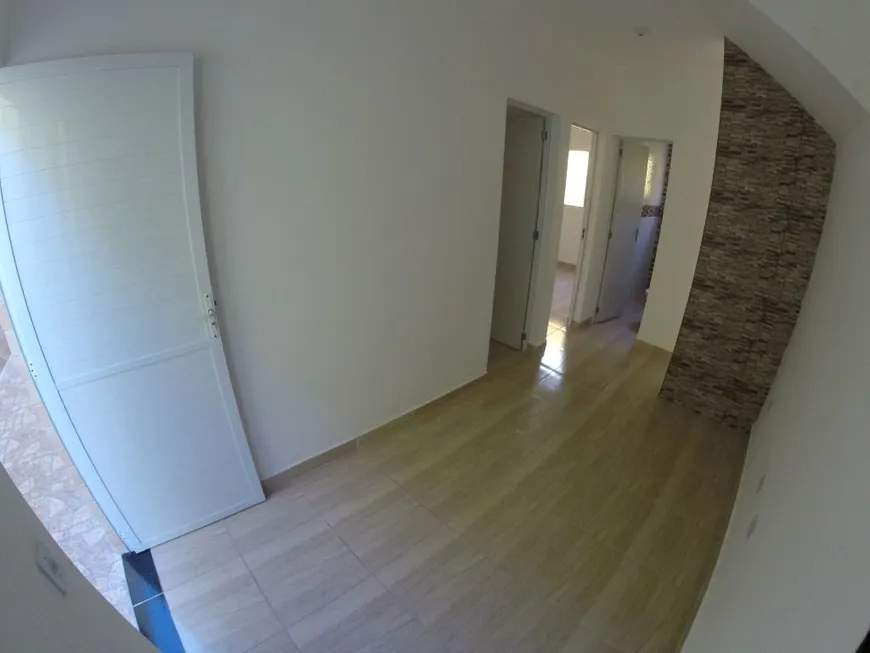 Foto 1 de Casa com 2 Quartos à venda, 55m² em Jardim Guaramar, Praia Grande