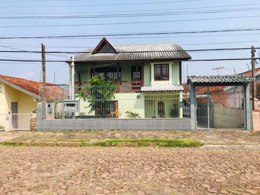 Foto 1 de Casa com 6 Quartos à venda, 278m² em Cavalhada, Porto Alegre