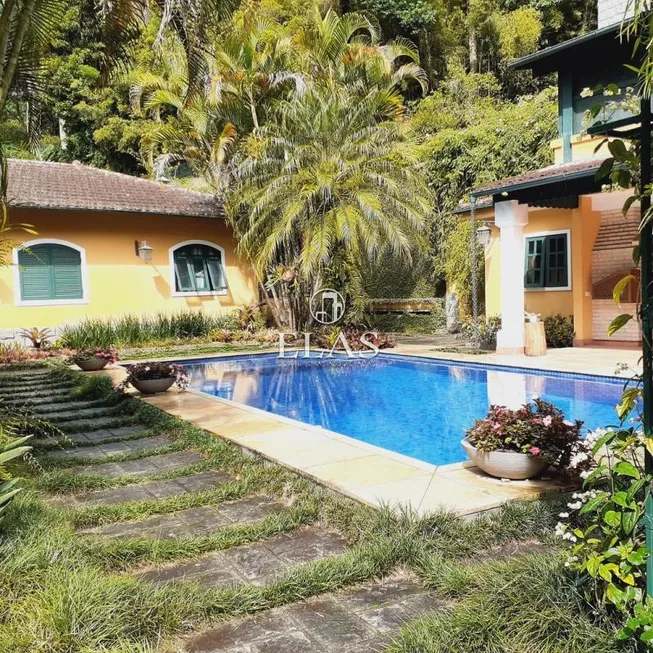 Foto 1 de Casa com 4 Quartos à venda, 200m² em Centro, Petrópolis